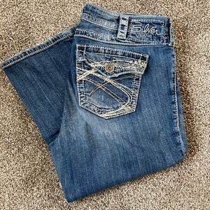 Silver jean capris in size 14.